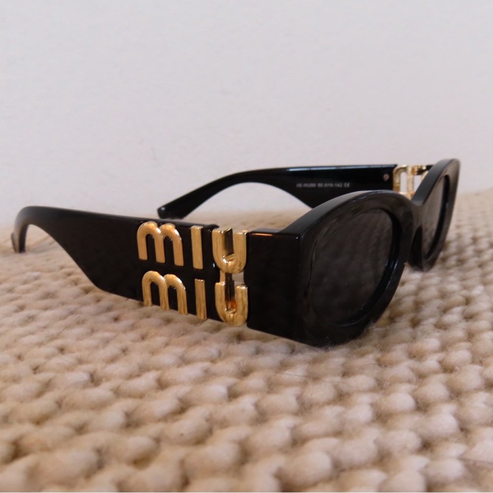 Miu Miu Black Sunglasses with Gold Temple Detail